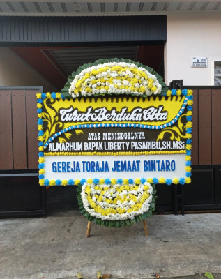 Papan Bunga Duka di Abang